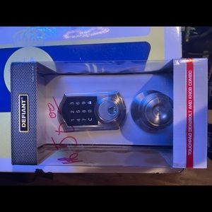 Touch pad lock for a door